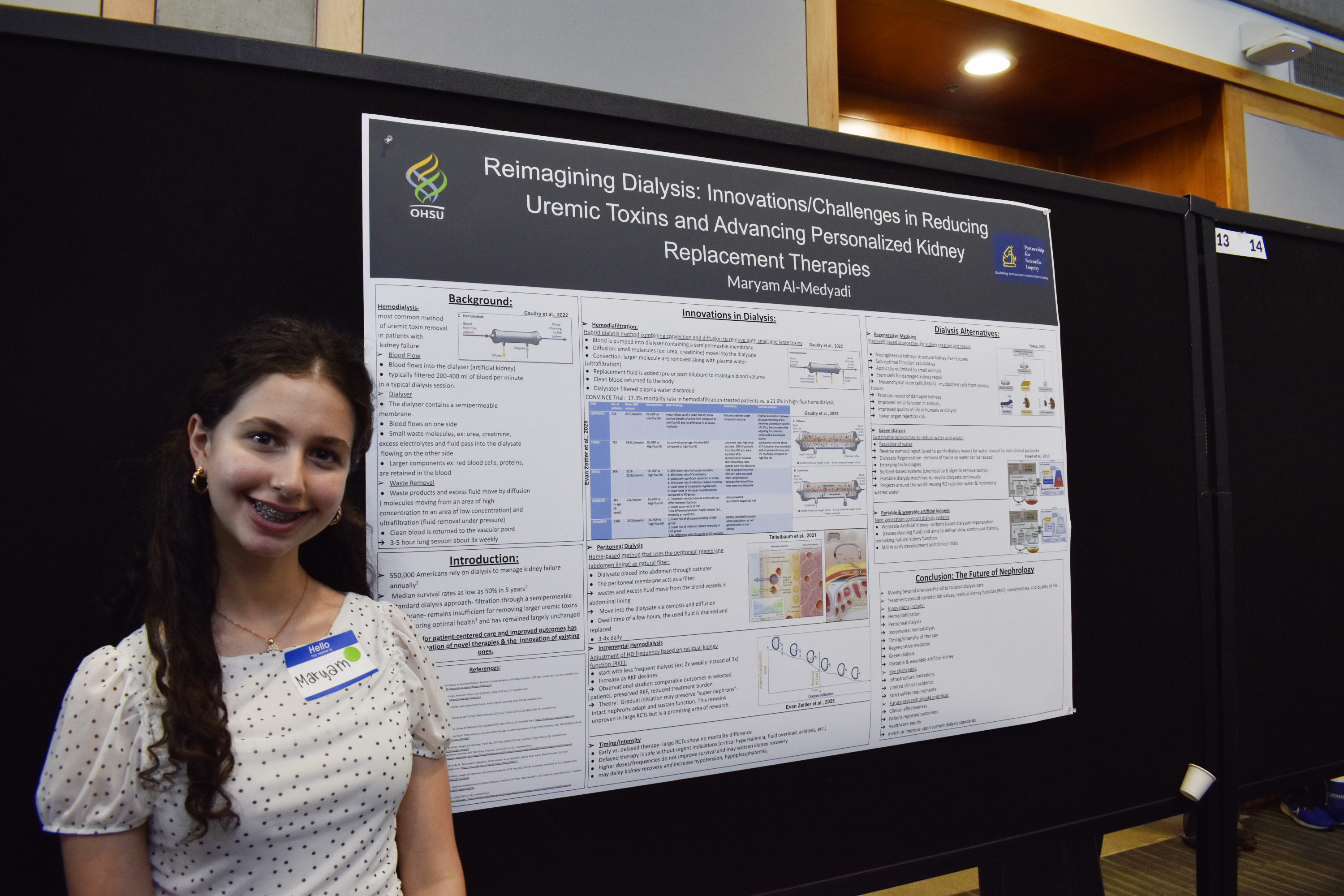 Maryam presenting her poster.