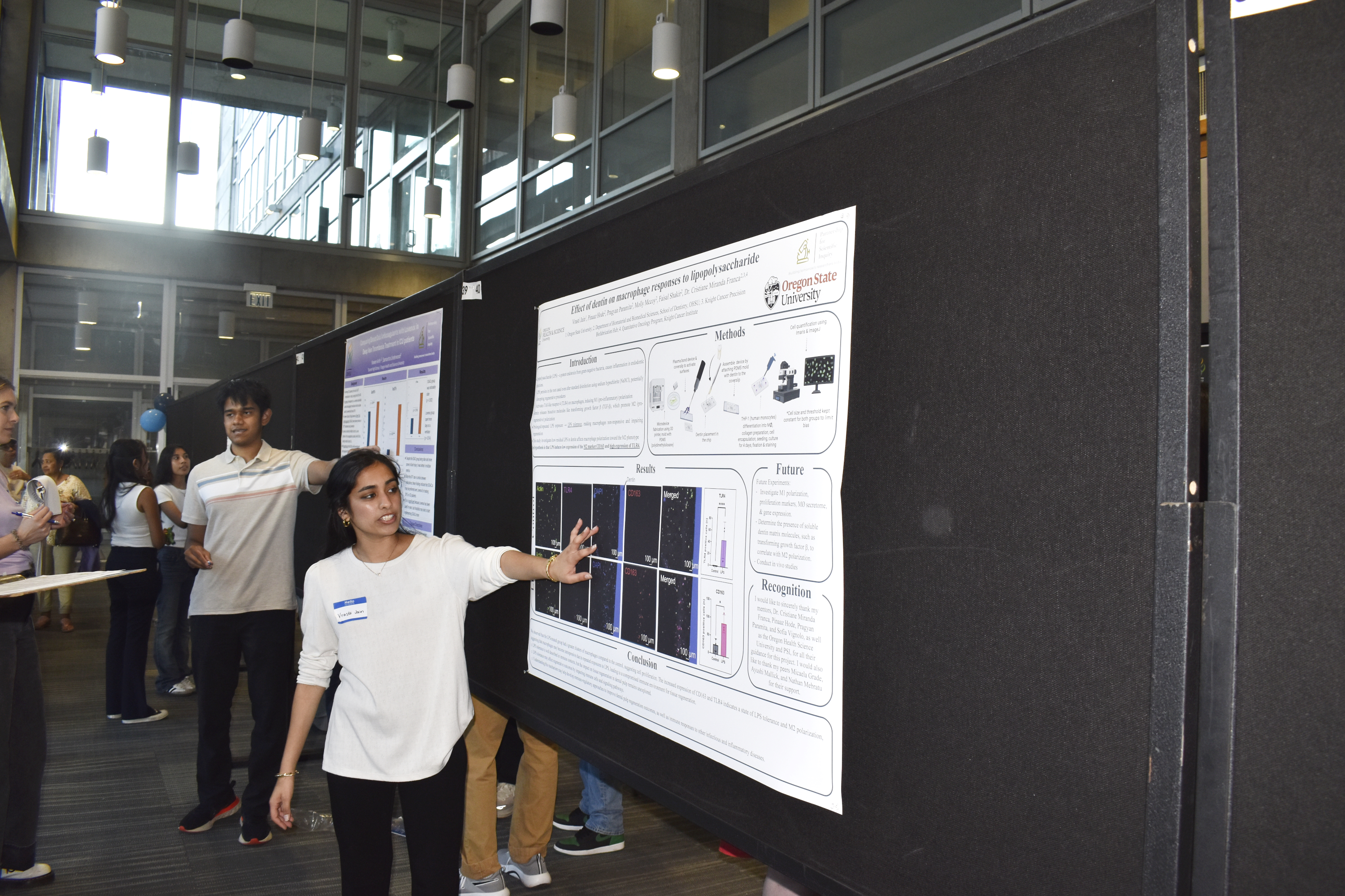Vrasti presenting her poster.